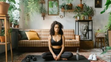 Serene yoga session at home with plants creating a calming ambiance.