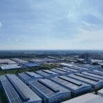 Aerial shot of a modern industrial park with warehouses in Bình Dương, Vietnam.