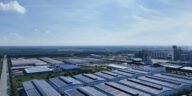 Aerial shot of a modern industrial park with warehouses in Bình Dương, Vietnam.