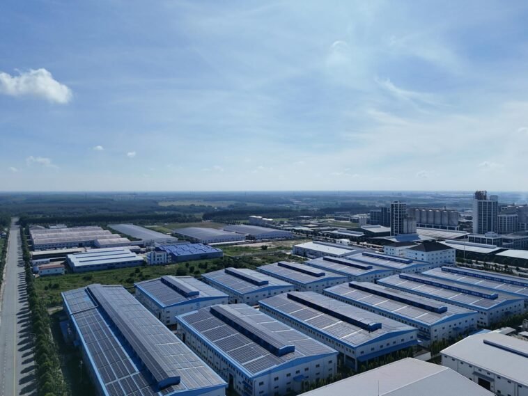 Aerial shot of a modern industrial park with warehouses in Bình Dương, Vietnam.